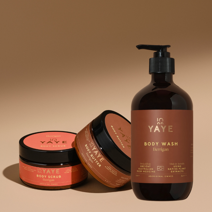Yaye body wash, scrub, and butter on a beige background