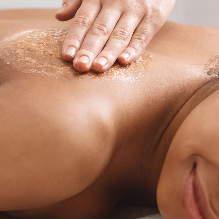 Yaye skin smoothing sugar based body scrub on back