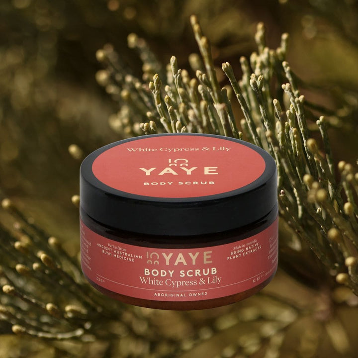 Front view of Yaye White Cypress & Lily Body Scrub displayed with native Australian bush medicine – Aboriginal-owned skincare