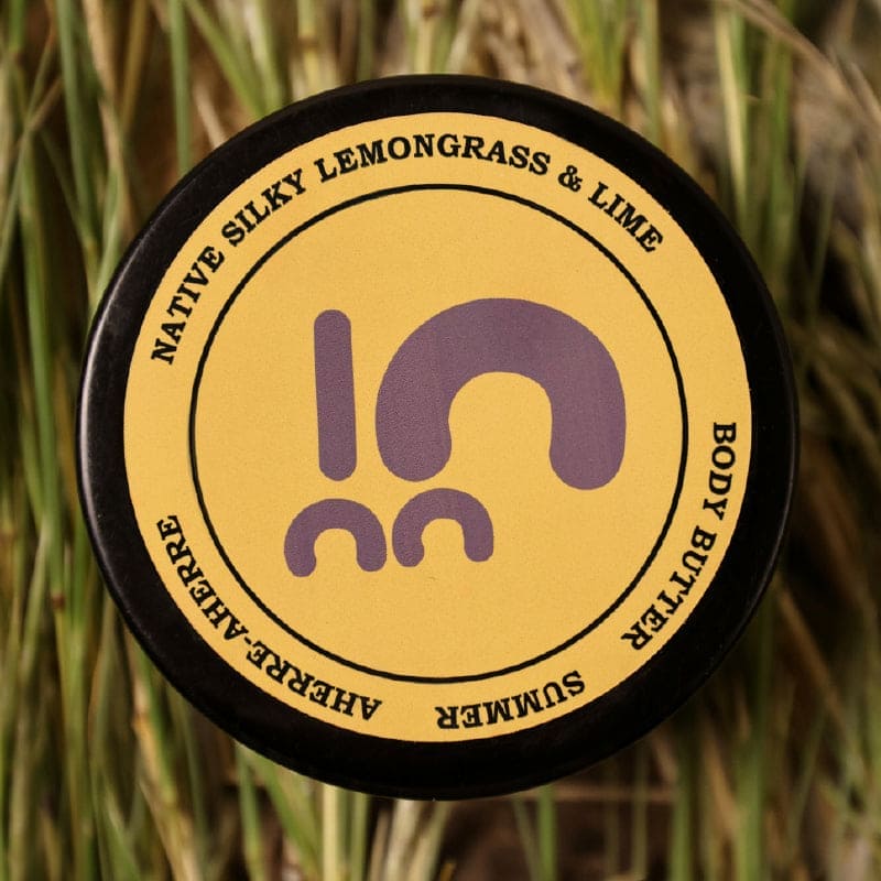 Lid on Yaye's Summer native silky lemongrass and lime moisturiser. Lemon lime scent. Australian made body butter.